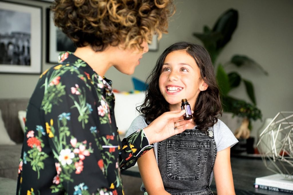 pexels photo 3969193 A happy mother and daughter sharing essential oils at home, enjoying a moment of wellness and bonding.