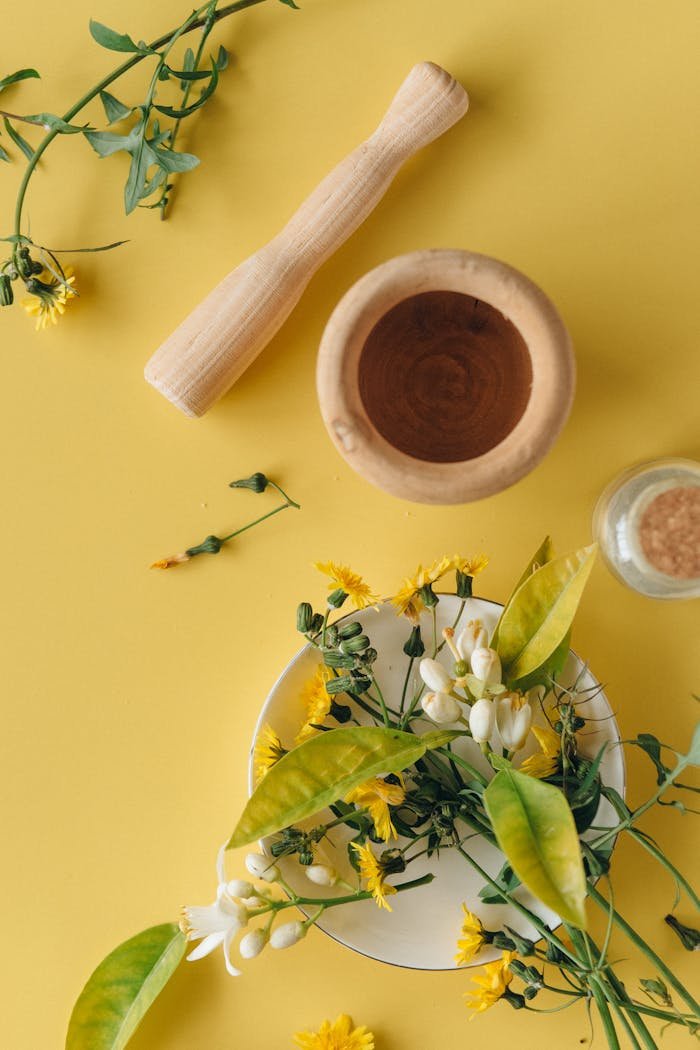 testimonial-img Herbal ingredients with a mortar and pestle on yellow background, perfect for natural remedy concepts.